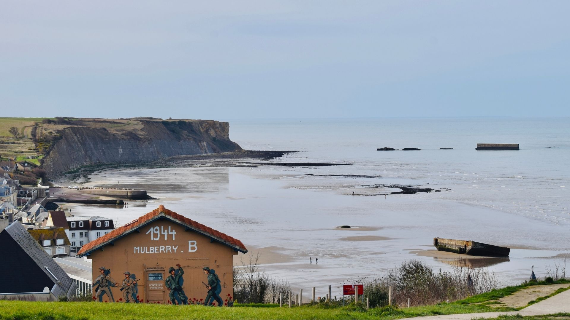 D-Day Mulberry Harbour Arromanches Gold Beach History Tour Paris Beyond D-Day Mulberry Harbour Arromanches Gold Beach artificial port remains - Paris and Beyond Tours Normandy WWII battlefield history tour France